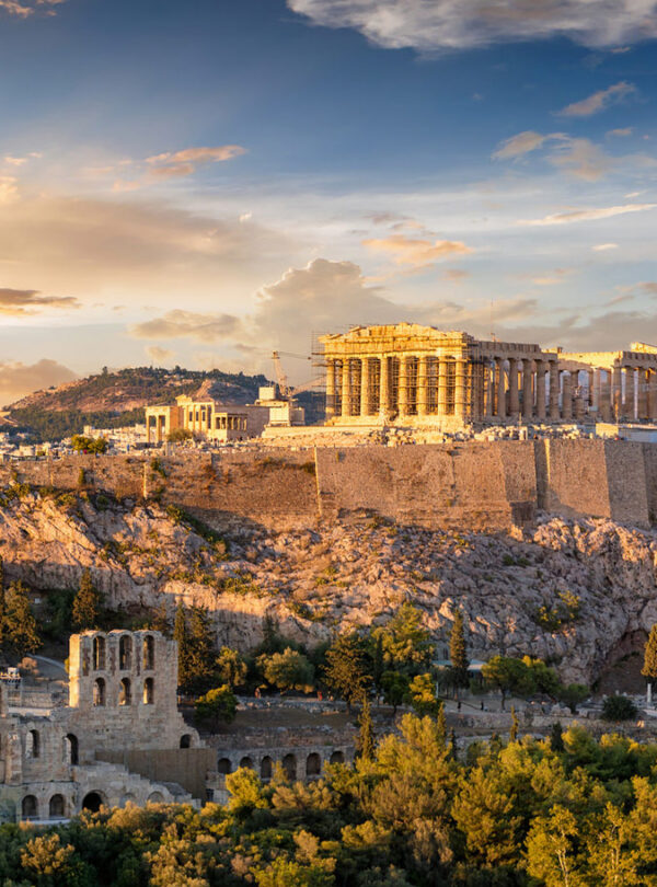 Panoramic view of the Acropolis and Parthenon in Athens at sunset, a highlight of any Athens city break.