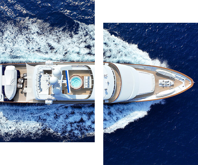 Luxury yacht cruising through deep blue waters, symbolizing exclusive travel experiences crafted with emotion and refinement.
